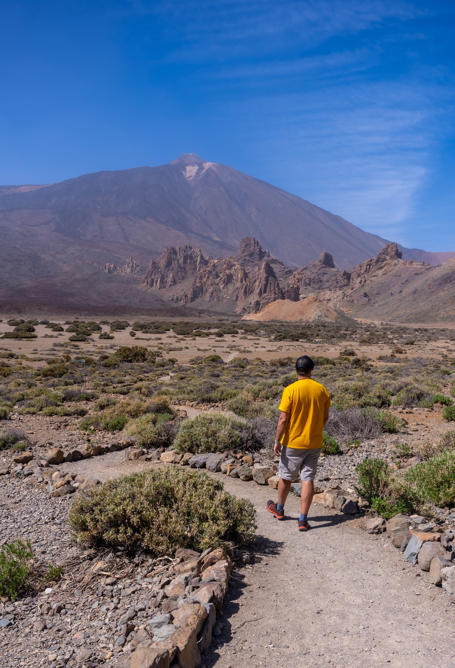 A young tourist on the volcano trekking in the Teide Natural Park in Tenerife